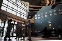 First Lt. Lydia Goodloe, 4th Mission Support Group executive officer, speaks with descendants of U.S. Navy Lt. Seymour Johnson, July 15, 2015, at Seymour Johnson Air Force Base, North Carolina. Johnson’s relatives toured the base to learn about their ancestry and the mission of the 4th Fighter Wing. (U.S. Air Force photo/ Senior Airman Daniel Blackwell)