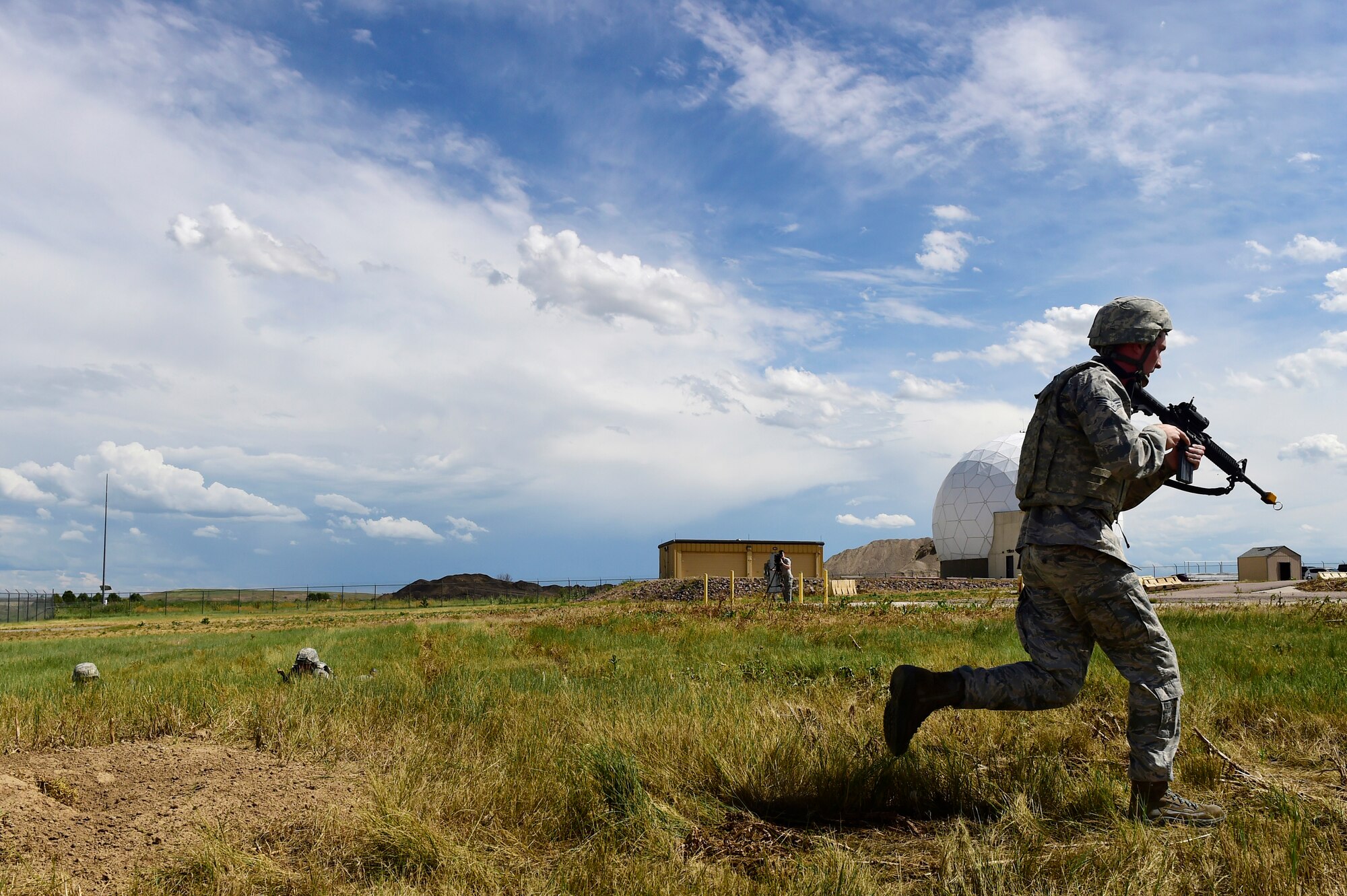 460th Security Forces Squadron Delta Flight members compete in the Flight of the Quarter competition July 16, 2015, on Buckley Air Force Base, Colo.  The competition is designed to test the Defenders’ expeditionary skills and build camaraderie within the flights. (U.S. Air Force photo by Staff Sgt. Stephany Richards/RELEASED)   