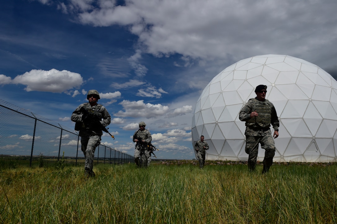 460th Security Forces Squadron Delta Flight members compete in the Flight of the Quarter competition July 16, 2015, on Buckley Air Force Base, Colo.  The competition is designed to test the Defenders’ expeditionary skills and build camaraderie within the flights. (U.S. Air Force photo by Staff Sgt. Stephany Richards/RELEASED)   