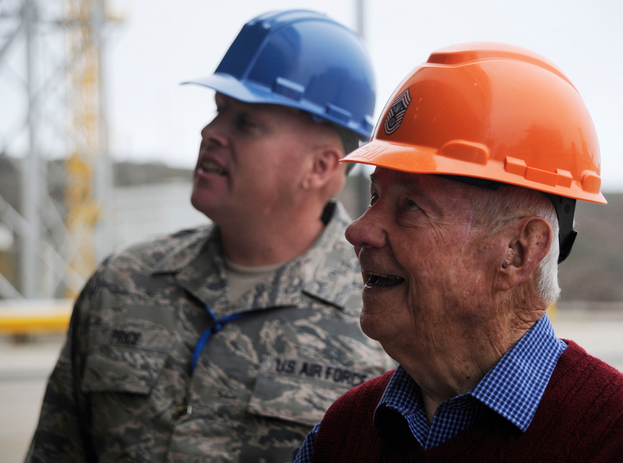 Chief Master Sgt. Jason Price, 30th Launch Group superintendent talks with Retired Chief Master Sgt. of the Air Force, Robert Gaylor, during a base tour, July 16, 2015, Vandenberg Air Force Base, Calif. Gaylor received a brief base tour of Vandenberg and spent most of his time engaging with Airmen during the many speaking engagements on his visit. (U.S. Air Force photo by Airman 1st Class Ian Dudley/Released)