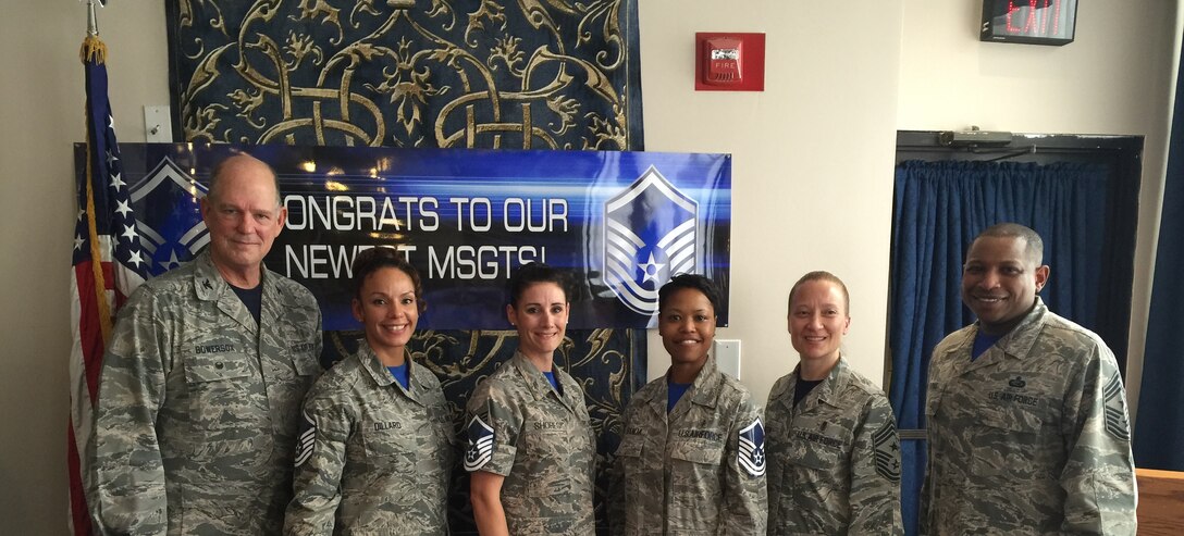 Colonel Robert Bowersox, 79th Medical Wing Commander, Chief Master Sgt. Michelle Thorsteinson-Richards, 79th Medical Wing Command Chief, and Chief Master Sergeant Farrell D. Thomas, Command Chief Master Sergeant for the Air Force District of Washington congratulate the 579th Medical Group Master Sgt. Selectees at a party on Joint Base Anacostia-Bolling. Advancement to master sergeant is one of the most significant promotions within the enlisted Air Force. At the rank of master sergeant, the airman enters the senior non-commissioned tier and his or her duties begin to focus on leadership and management rather than technical performance. (AF Photo by Staff Sgt. Jillian Kozub)