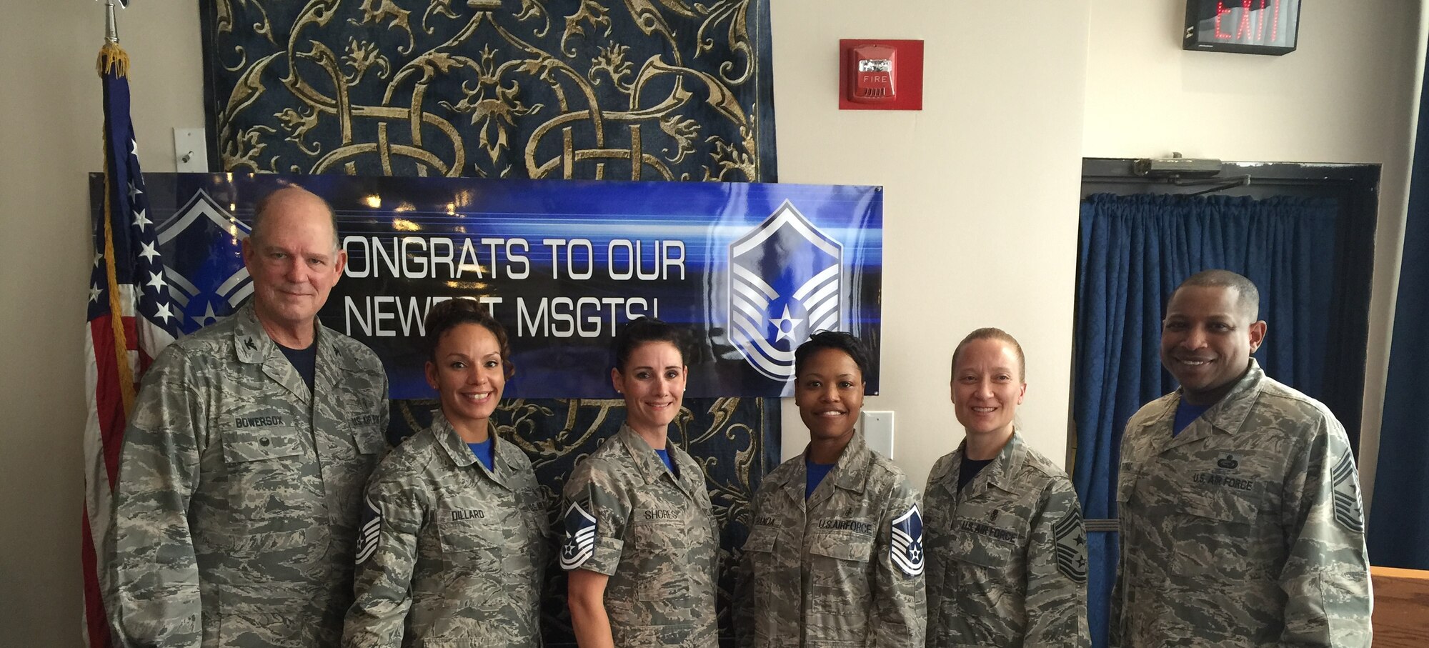 Colonel Robert Bowersox, 79th Medical Wing Commander, Chief Master Sgt. Michelle Thorsteinson-Richards, 79th Medical Wing Command Chief, and Chief Master Sergeant Farrell D. Thomas, Command Chief Master Sergeant for the Air Force District of Washington congratulate the 579th Medical Group Master Sgt. Selectees at a party on Joint Base Anacostia-Bolling. Advancement to master sergeant is one of the most significant promotions within the enlisted Air Force. At the rank of master sergeant, the airman enters the senior non-commissioned tier and his or her duties begin to focus on leadership and management rather than technical performance. (AF Photo by Staff Sgt. Jillian Kozub)