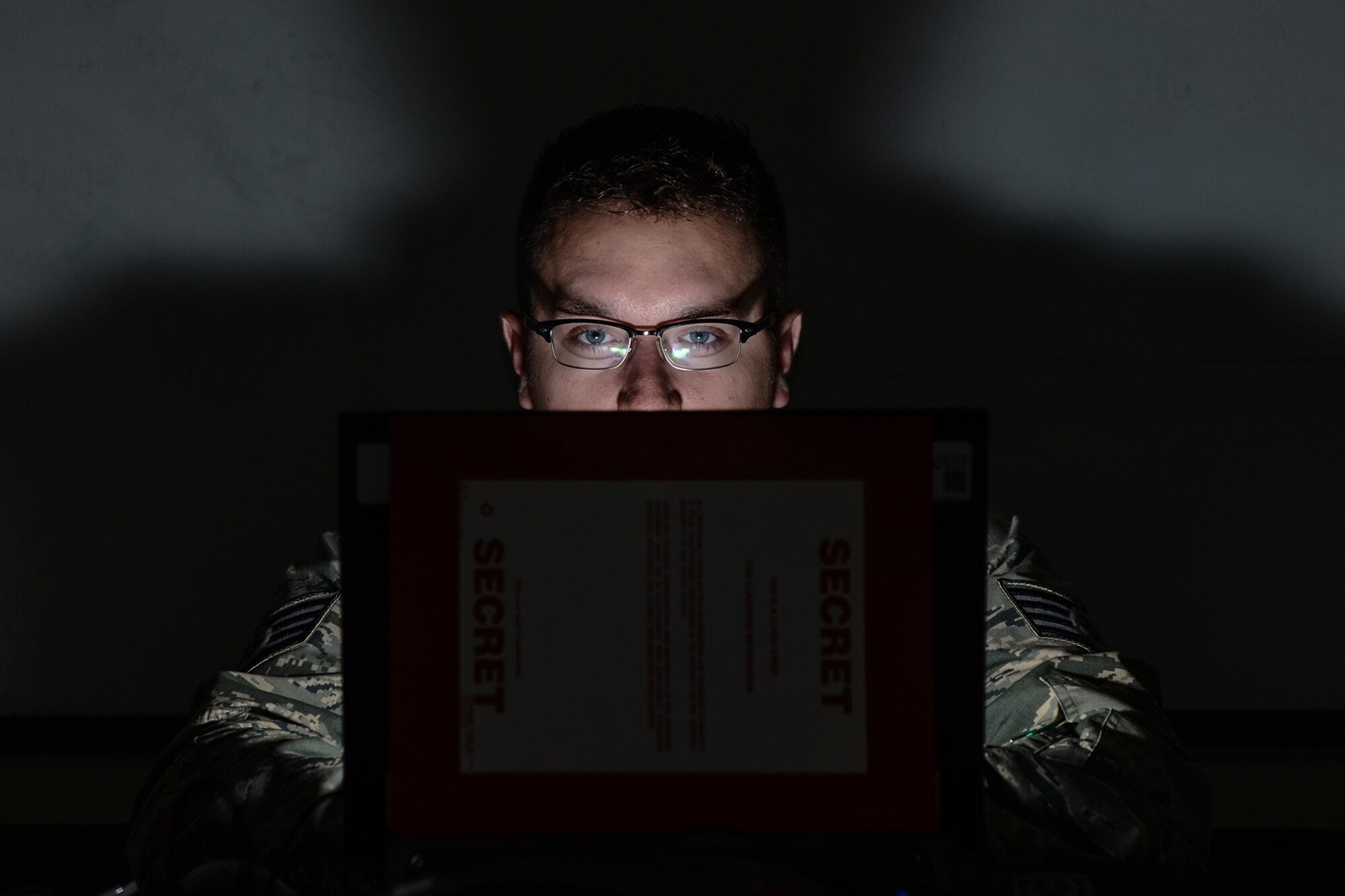 U.S. Air Force Staff Sgt. Kyle Baker, active associate Intel analyst with the 169th Operations Support Squadron, views a computer screen at McEntire Joint National Guard Base, S.C. June 14, 2015.  
(S.C. Air National Guard photo by Tech. Sgt. Jorge Intriago/RELEASED)