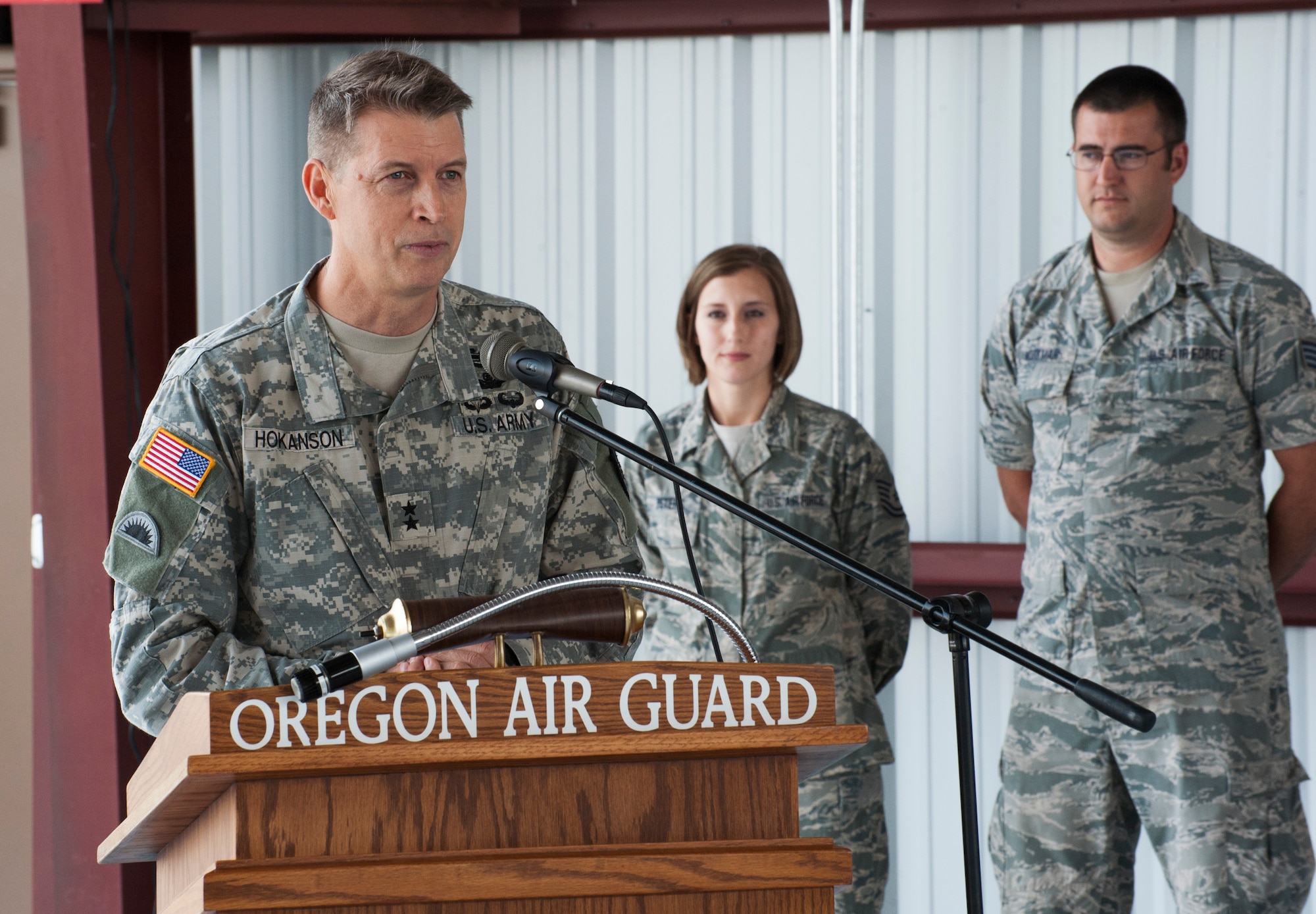 Oregon Army National Guard Maj. Gen. Daniel R. Hokanson, Adjutant General, Oregon, discusses the role of the 142nd Fighter Wing with regard to its Aerospace Control Alert mission during the official ribbon cutting ceremony for the new alert barn at the Portland Air National Guard Base, Ore., July 10. The 142 Fighter Wing is tasked with protecting the skies over the Pacific Northwest, from northern California to the Canadian border, and extending out along the Pacific coastline. (U.S. Air National Guard photo by Tech. Sgt. John Hughel, 142nd Fighter Wing Public Affairs/Released)