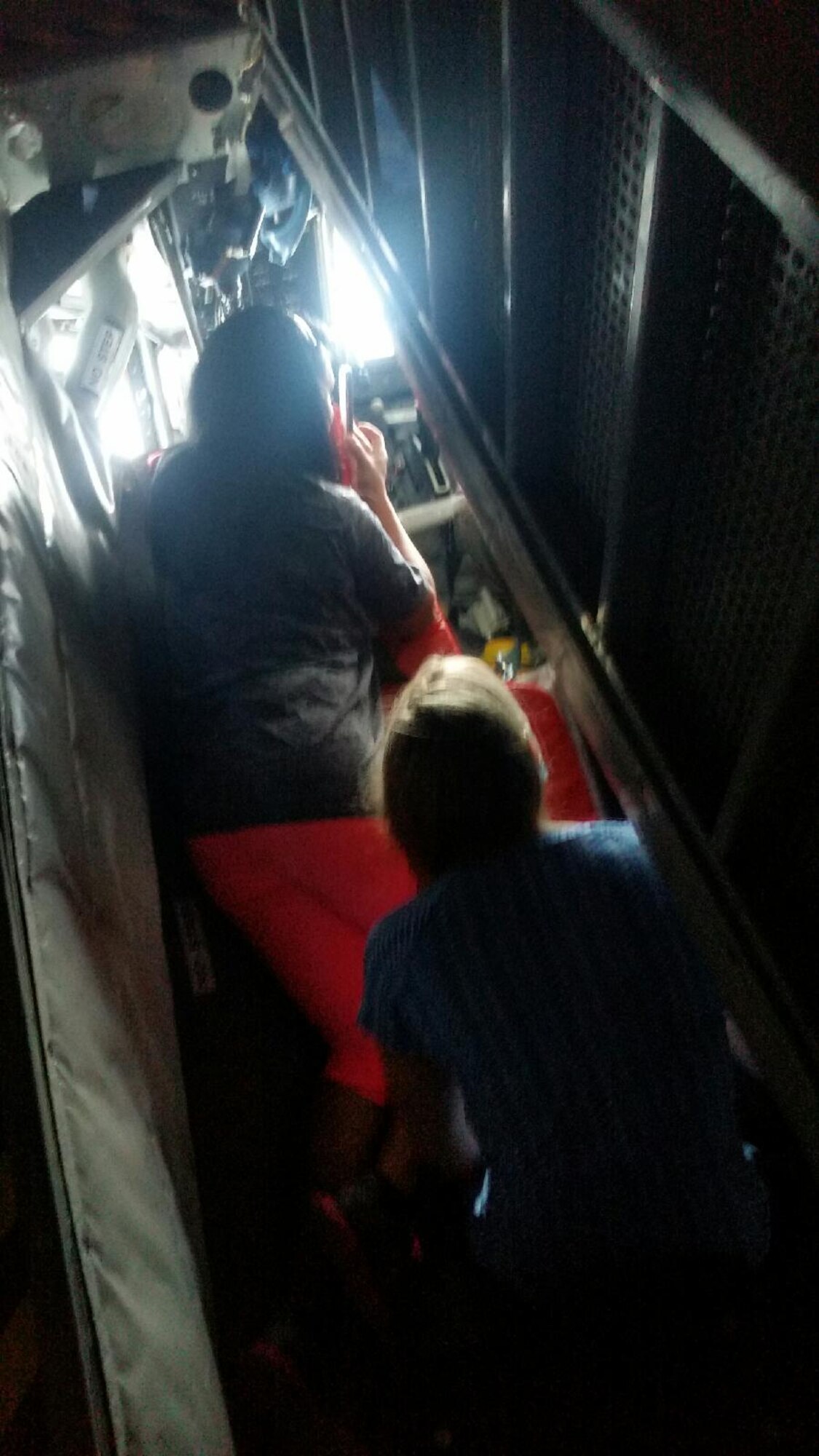 Employers and business leaders from Mississippi take turns observing a KC-135 Stratotanker boom operator refuel a C-17 Globemaster as they participate in a Boss Lift July 15, 2015. The 186th Air Refueling Wing and Mississippi Employer Support of the Guard and Reserve (ESGR) hosted the Boss Lift to provide employers an opportunity to see first-hand what citizen-Airmen experience while away from work to attend military training or activated for a federal or state mission.  (Courtesy photo)