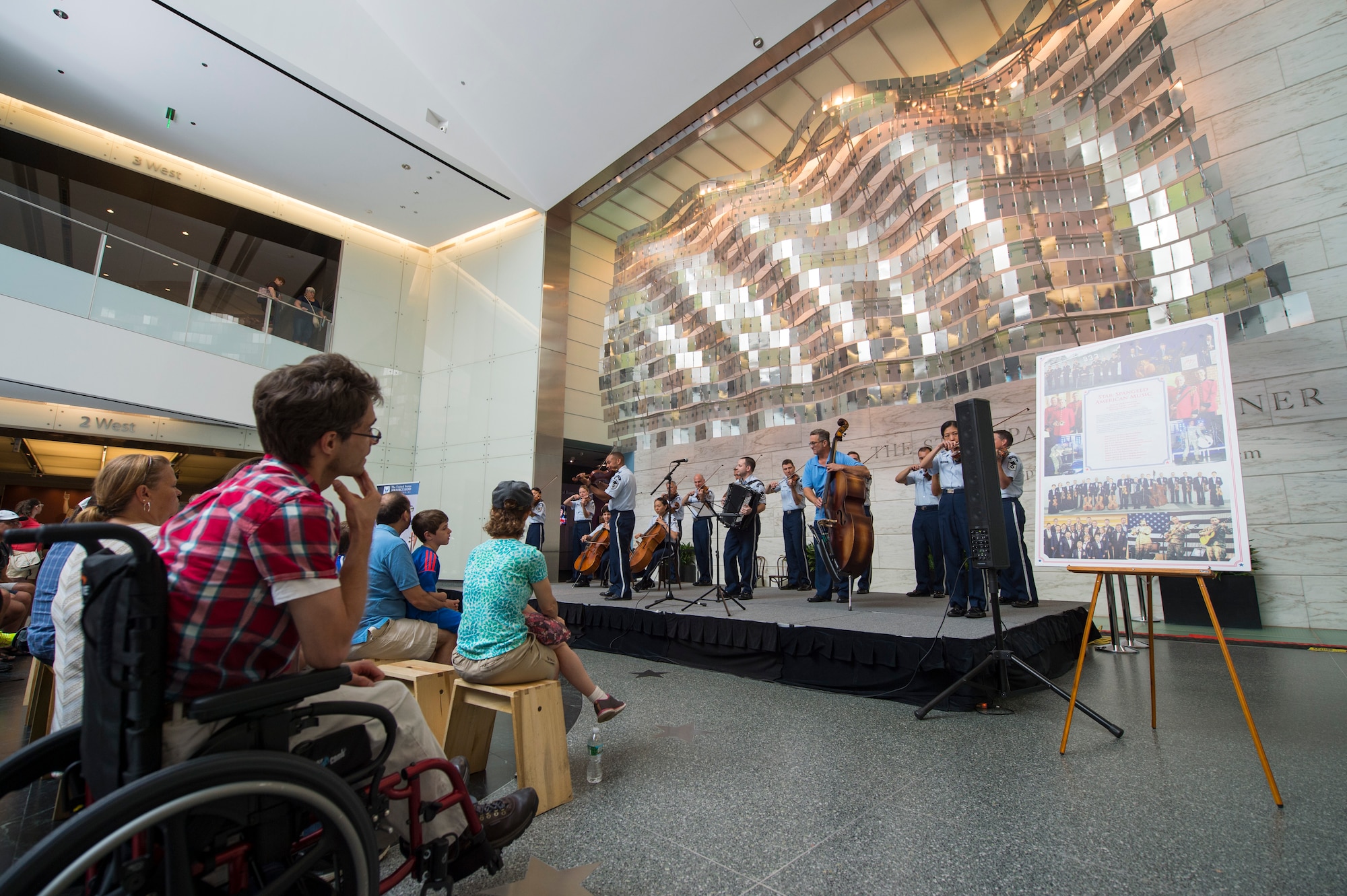 Guests of the National Museum of American History listen to the U.S. Air Force Band’s Strolling Strings during a concert held in Washington, D.C., July 16, 2015. The Strolling Strings performance was part of the museum’s Star-Spangled American Music Series. (U.S. Air Force photo/Airman 1st Class Ryan J. Sonnier)
