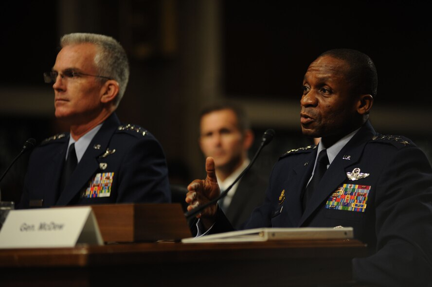 Gen. Paul J. Selva, the nominee for vice chairman for the Joint Chiefs of Staff, and Gen. Darren W. McDew, the nominee for U.S. Transportation Command commander, sit before Congress to testify for their future positions during their nomination hearing July 14, 2015. Both were nominated by President Barack Obama and expressed their gratitude for the nomination, and if selected look forward to working together with Congress, the Defense Department, and other branches of the government and military. (U.S. Air Force photo/Senior Airman Hailey Haux)