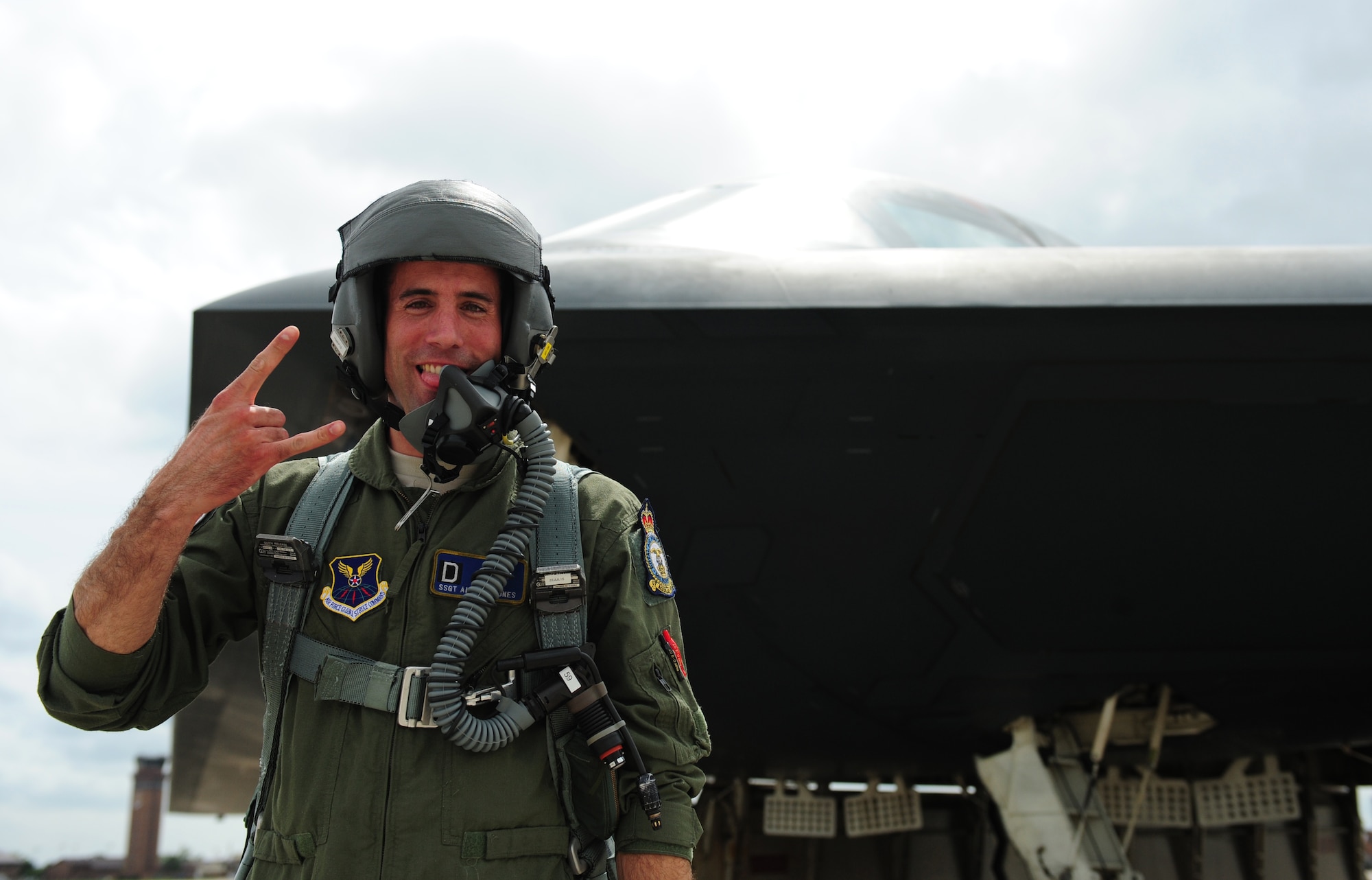 Tech. Sgt. Andrew Jones, 509th Aircraft Maintenance Squadron dedicated crew chief, celebrates after his incentive flight in a B-2 Spirit at Whiteman Air Force Base, Mo., July 10, 2015. Only eight enlisted personnel have ever received a flight in a B-2 Spirit. 
(U.S. Air Force photo by Senior Airman Joel Pfiester/Released)
