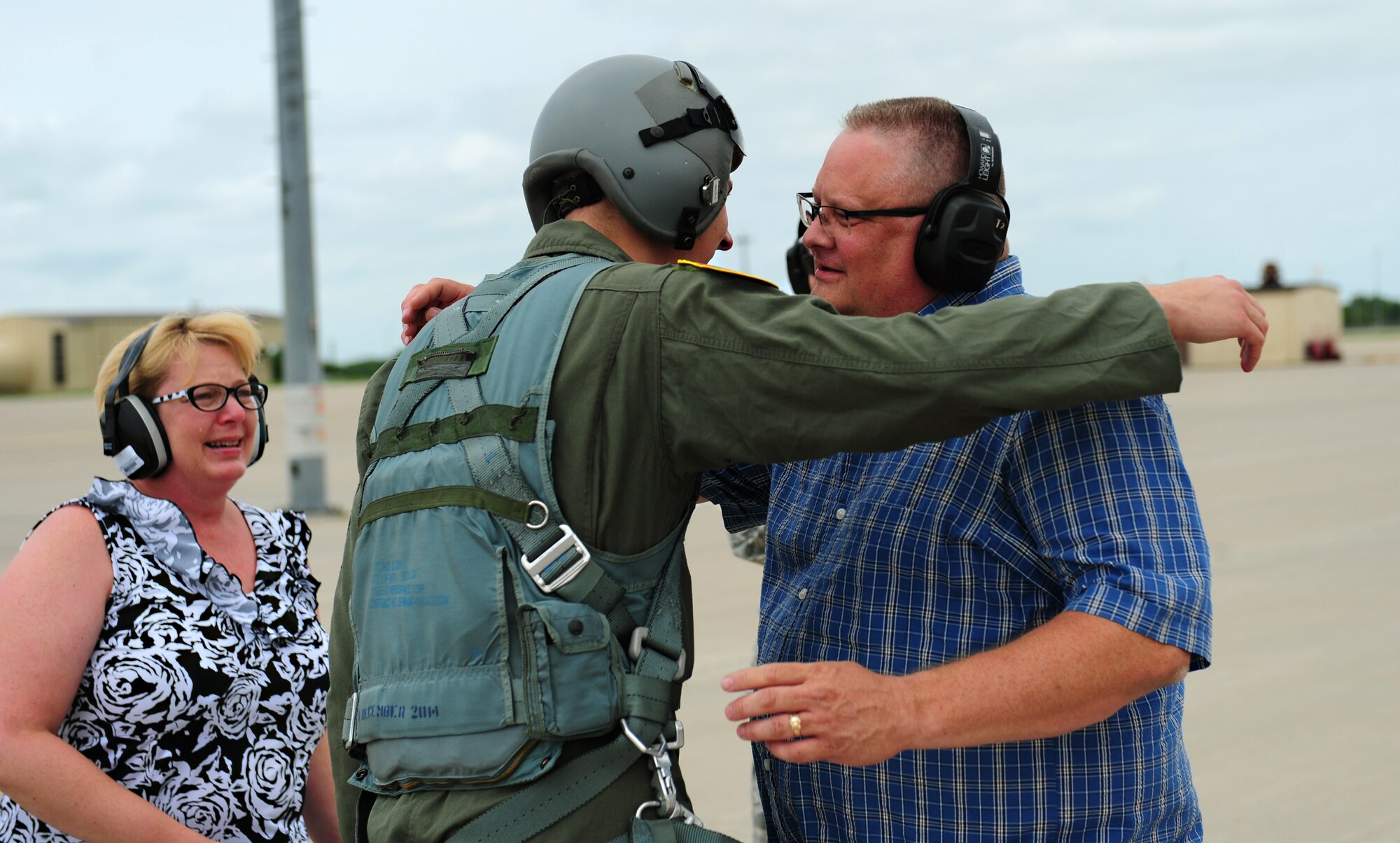 Air Force Staff Sgt. Brian Schroeder, 509th Aircraft Maintenance Squadron dedicated crew chief, hugs his father after finishing his B-2 Spirit incentive flight at Whiteman Air Force Base, Mo., July 10, 2015. Schroeder was awarded an incentive flight in the B-2 Spirit for being named the 2014 Air Force Global Strike Command Crew Chief of the Year.
(U.S. Air Force photo by Senior Airman Joel Pfiester/Released)
