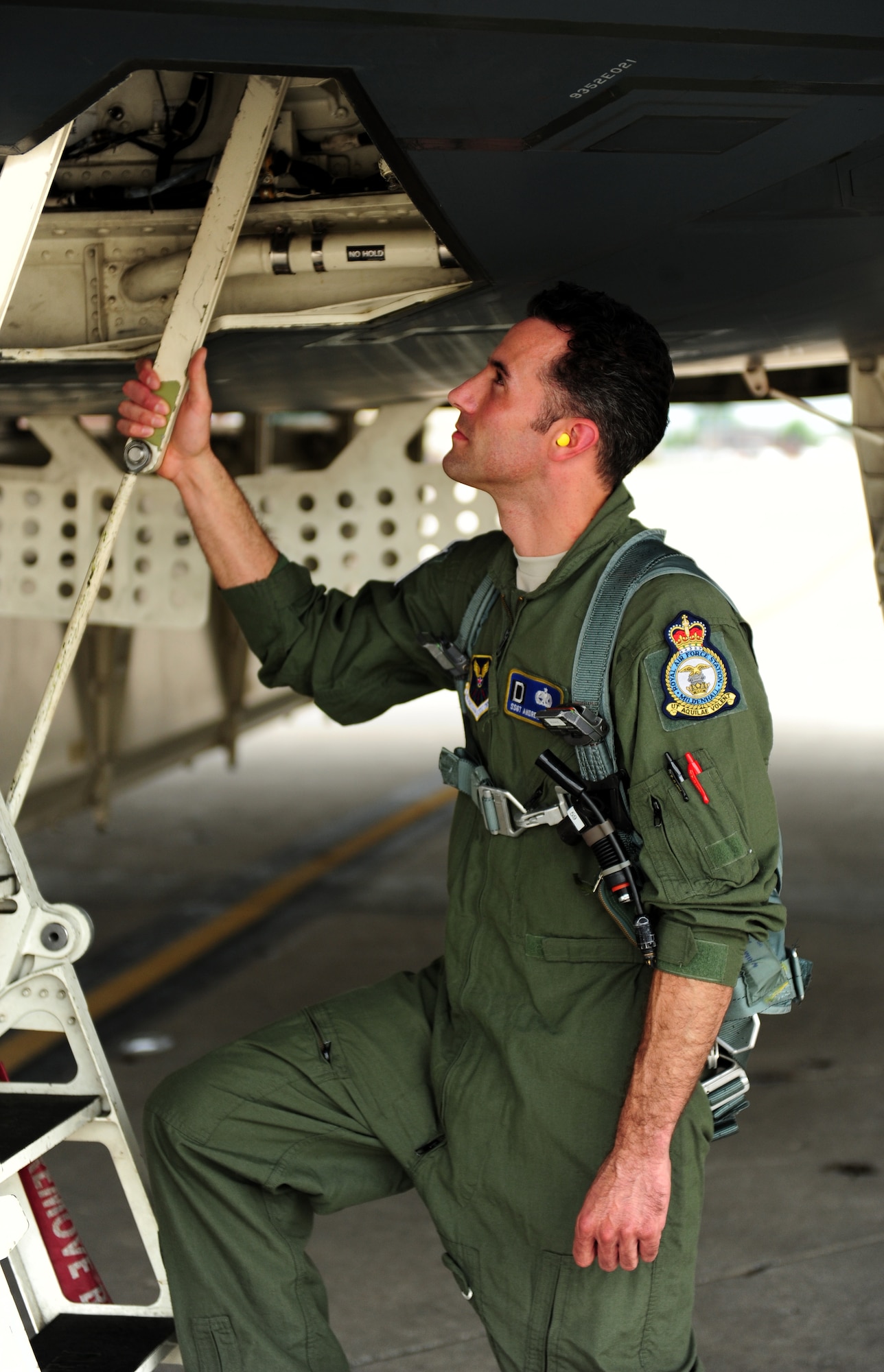 Tech. Sgt. Andrew Jones, 509th Aircraft Maintenance Squadron dedicated crew chief, prepares to board a B-2 Spirit at Whiteman Air Force Base, Mo., July 10, 2015. Jones was awarded an incentive flight in the B-2 Spirit for being named the 2013 Air Force Global Strike Command Crew Chief of the Year. Two other Crew Chiefs of the Year were also given incentive flights the same day. (U.S. Air Force photo by Senior Airman Joel Pfiester/Released)
