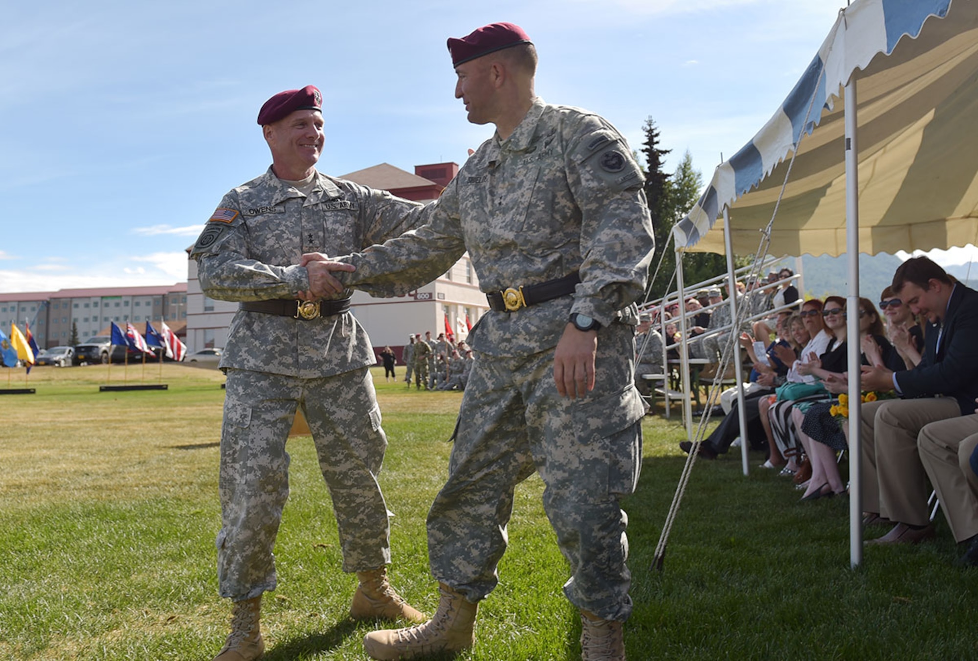 After serving as the U.S. Army Alaska commander for the past two years, Maj. Gen. Michael Shields passed the unit colors and leadership of America’s Arctic Warriors to Maj. Gen. Bryan Owens during a change of command ceremony, Friday, July 10, 2015, on Joint Base Elmendorf-Richardson, Alaska. The ceremony was presided over by Gen. Vincent Brooks, commander of U.S. Army Pacific, and held on Pershing Field in front of the U.S. Army Alaska headquarters. (U.S. Air Force photo/Justin Connaher)