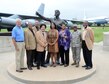 Members of the Charles B. Hall Chapter of the Tuskegee Airmen Inc., family members of Tuskegee Airmen and others gathered at the Maj. Charles B. Hall Airpark July 8 for photos with the major’s statue. From left, Mark Tarpley, president of the Air Force Association Gerrity Chapter; Ed Woodward Jr., son of original Tuskegee Airman Capt. Edward Woodward Sr.; Tom Harmon; Karl Wilburn, son of original Tuskegee Airman Lt. Arthur Wilburn; Kelly Hall Jones and Sherri Hall Harris, daughters of Major Hall; Col. Stephanie Wilson, 72nd Air Base Wing commander; and Mahlon Smith, president of the Charles B. Hall Chapter of Tuskegee Airmen Inc. Afterward, the group attended a presentation about the history of African American aviation and the Tuskegee Airmen. (Air Force photo by Kelly White/Released)