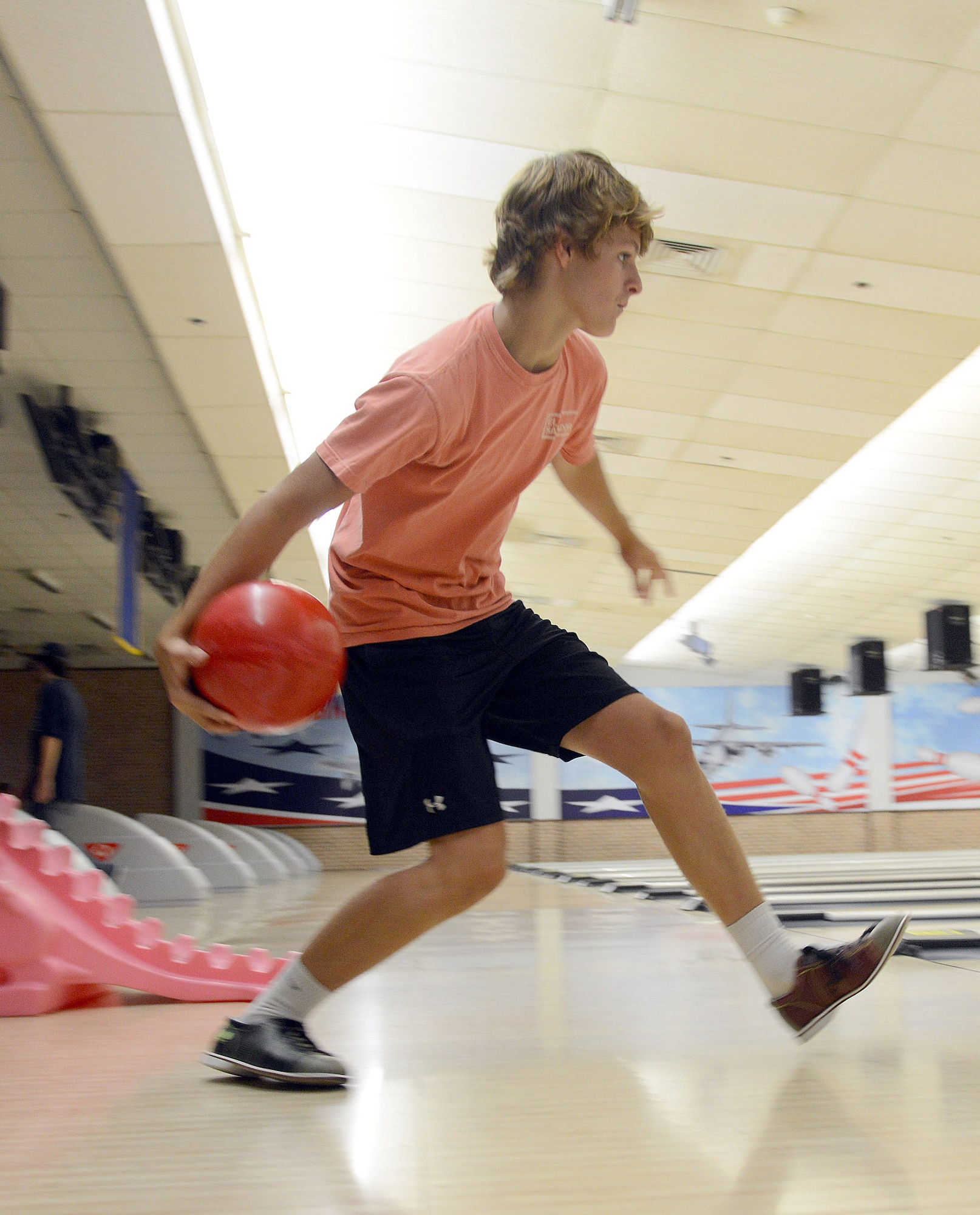 Josh Heyen, 15, enjoys an afternoon of bowling at Robins Lanes. The bowling center is available to all active duty, retirees and their family members, Department of Defense civilians and their family members, DOD contractors and technical representatives, and guests accompanied by authorized individuals. 
 (U.S. Air Force photo by Tommie Horton)