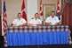 Lt. Col. Don Saunders, left, Brig. Gen. Alain Pelletier, center, and Lt. Col. Pete Dozois sign change of command orders July 10 at a Tinker Club ceremony in which Saunders became the new leader of the 552nd Air Control Wing Canadian Detachment. (Air Force photo by John Parker/Released)