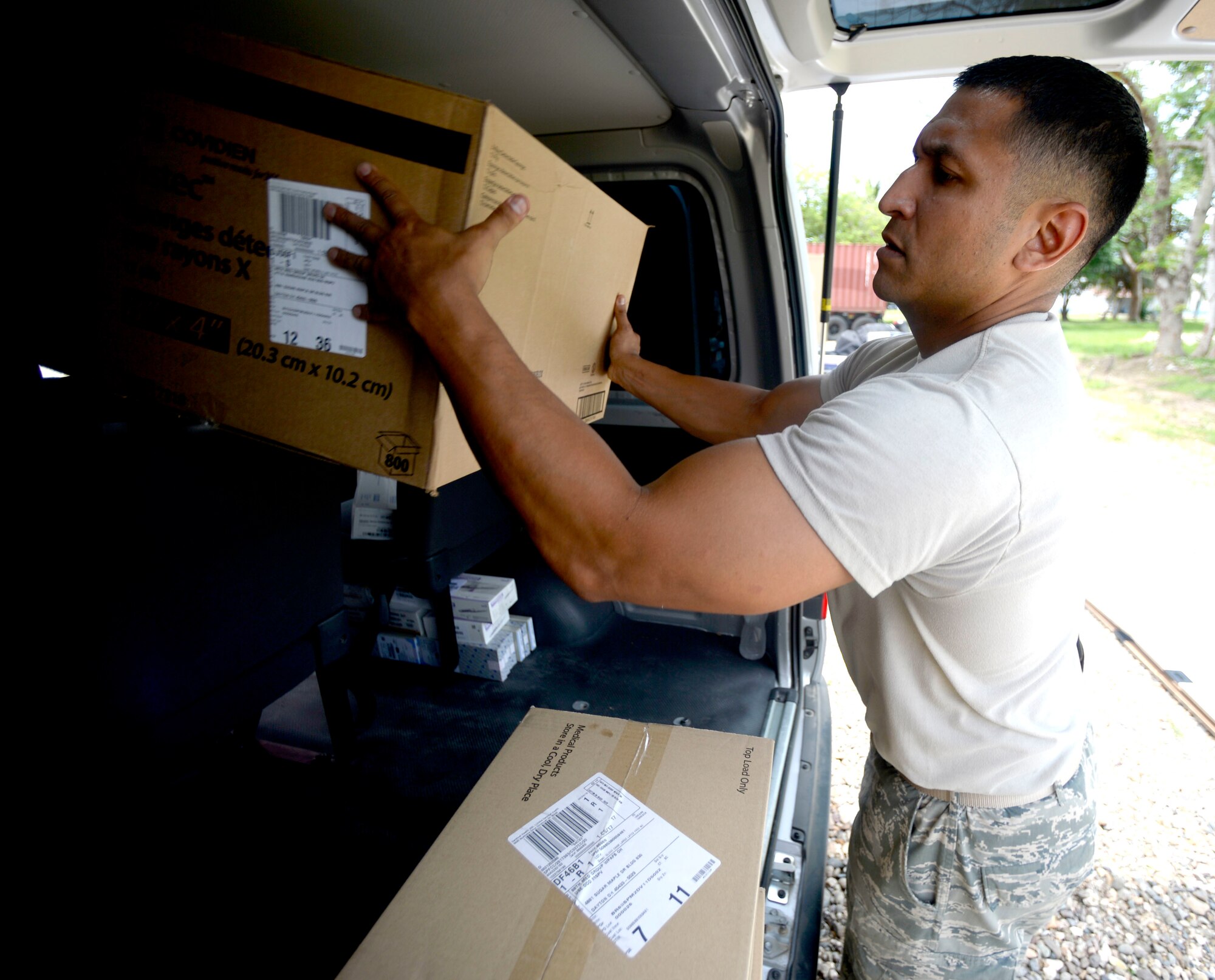 Tech Sgt. Mark Lopez loads a vehicle with medical supplies at Puerto Castillo Naval Base, Honduras, for delivery to Dr. Salvador Parades Hospital in Trujillo, Honduras July 16, 2015. The medical supplies will be used to support New Horizons Honduras 2015 training exercise personnel and the people of Honduras. New Horizons was launched in the 1980's as an annual joint humanitarian assistance exercise that U.S. Southern Command conducts with a partner nation in Central America, South America or the Caribbean. The exercise improves joint training readiness of U.S. and partner nation civil engineers, medical professionals and support personnel through humanitarian assistance activities. Lopez is a 35th Medical Support Squadron biomedical equipment technician at Scott Air Force Base, Illinois. (U.S. Air Force photo by Capt. David J. Murphy/Released) 