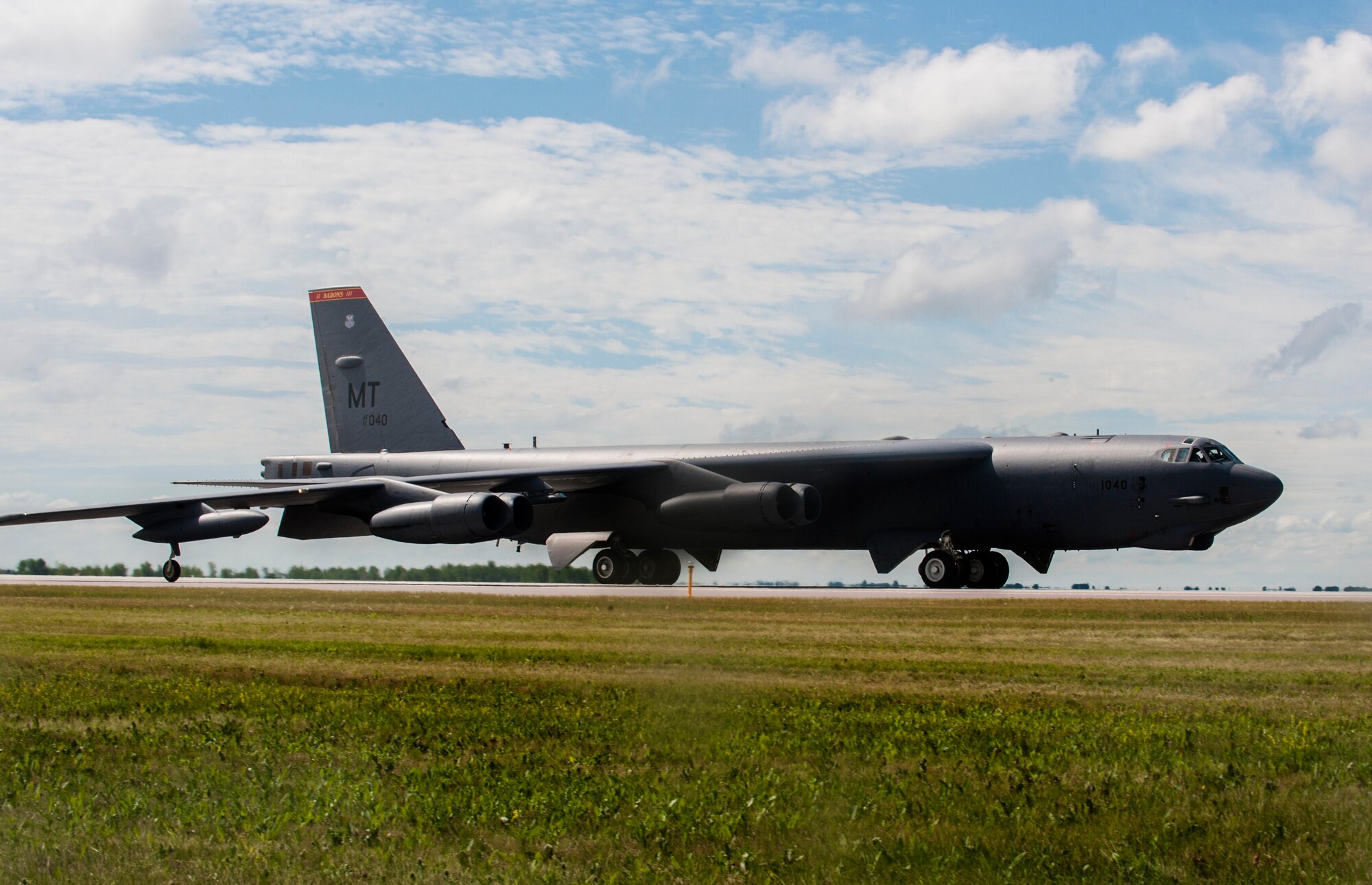 A B-52H Stratofortress taxies down the runway at Minot Air Force Base, N.D., July 16, 2015. The crew took to the skies to take part in Team Minot’s first competition of Air Force Global Strike Command’s Global Strike Challenge 2015, a head-to-head contest across AFGSC’s bomber and missile wings. (U.S. Air Force photo/Senior Airman Stephanie Morris)