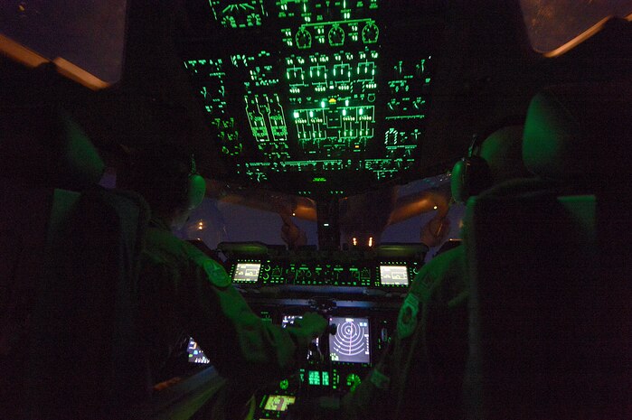 U.S. Air Force Maj. Dana Dailey 446 Airlift Wing, McChord Air Force Base, Wash. pilots a C-17 Globemaster III into position to conduct aerial refueling with a KC-10 Extender during an airdrop mission with U.S. Army Soldiers from 3rd Battalion, 509 infantry Brigade in support of Exercise Talisman Sabre July 7, 2015, over the Pacific Ocean. Exercise Talisman Sabre is a U.S. Pacific Command (PACOM)- sponsored exercise that trains PACOM forces in a high-end, mid-intensity warfighting scenario involving a Combined Task Force (CTF). PACOM forces and Australian Defense Forces (ADF) will establish, constitute, command and control a Combined Task Force (CTF-660) of U.S. and Australian forces that will enable assessment of the primary training audiences in order to exercise combined operational warfighting in the Pacific theater. (U.S. Air Force photo by Tech. Sgt. Jason Robertson/Released)