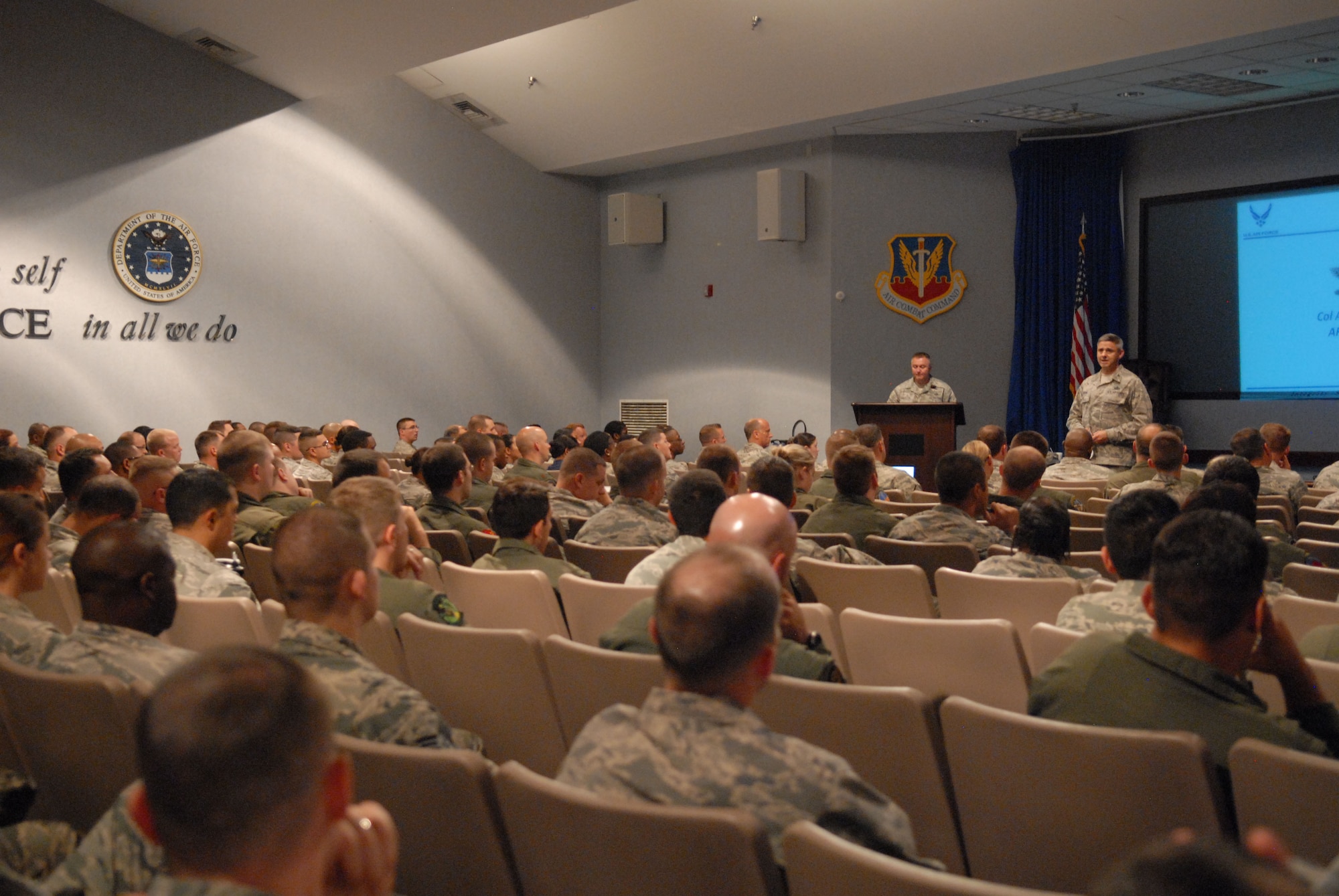 (Standing right) Col. Arch Bruns, director of Personnel Services, provides opening remarks during an enlisted evaluation and promotion system briefing, July 14, 2015.(U.S. Air Force photo by Misuzu Allen) 