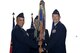 U.S. Air Force Col. Mohan S. Krishna, 55th Operations Group commander at Offut Air Force Base, Neb., passes the guidon to U.S. Air Force Lt. Col. Keith Webster, incoming 95th Reconnaissance Squadron commander, during the change of command ceremony July 15, 2015, on RAF Mildenhall, England. The passing of the unit guidon during a change of command ceremony is a symbolic representation of passing authority to the incoming commander for all to see. (U.S. Air Force photo by Senior Airman Kate Thornton/Released)