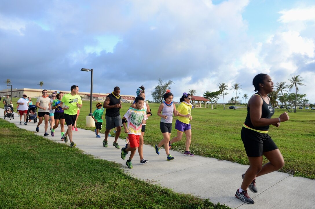 Runners start the Reggae 5K run July 16, 2015, at Andersen Air Force Base, Guam. Approximately 80 participants competed in the reggae-themed 5K run organized by the 36th Force Support Squadron. (U.S. Air Force photo by Airman 1st Class Arielle Vasquez/Released)