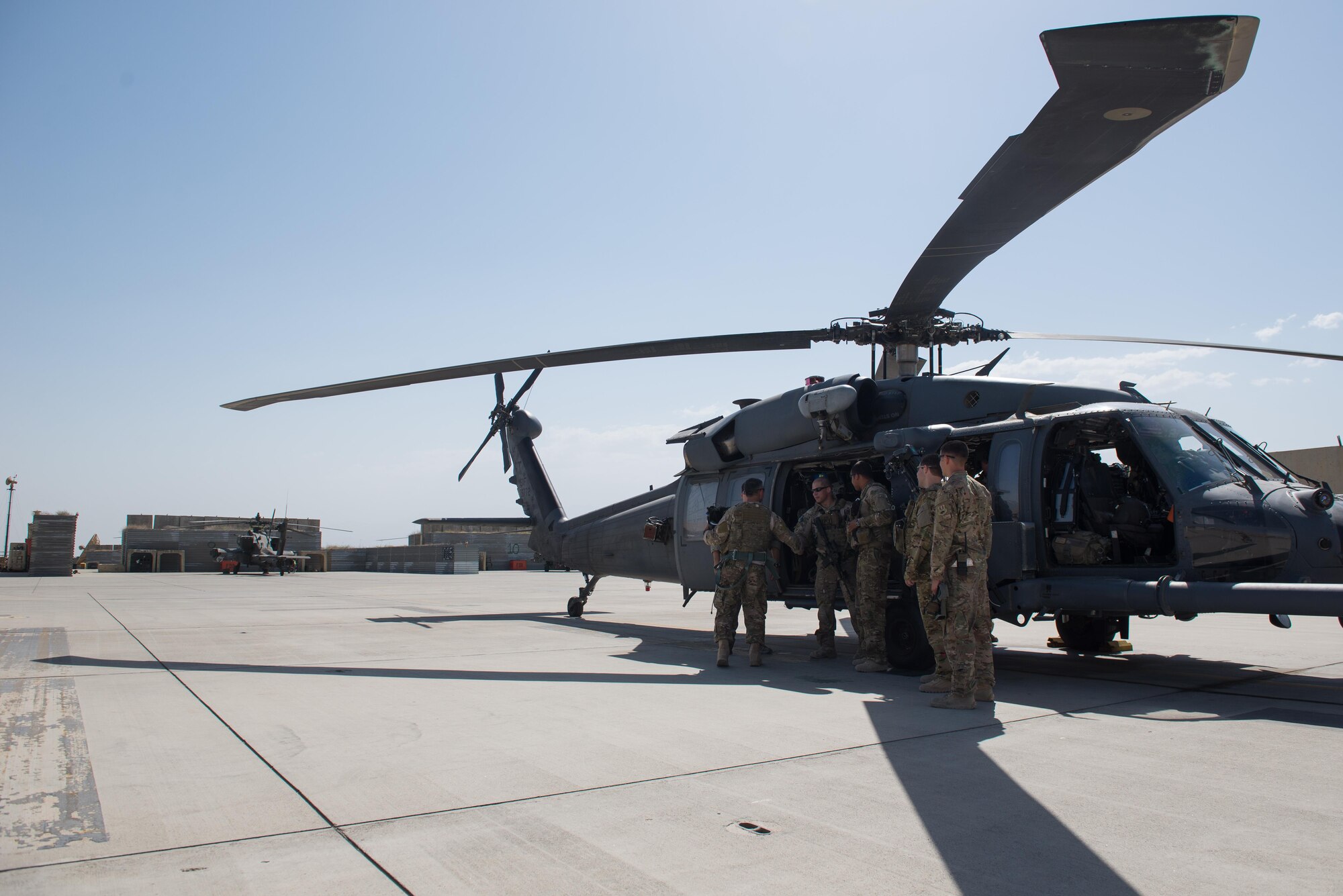 U.S. Air Force Brig. Gen. Dave Julazadeh, 455th Air Expeditionary Wing commander, center, greets members of the 83rd Expeditionary Rescue Squadron before a mission July 16, 2015, at Bagram Airfield, Afghanistan. Julazadeh took part in a training mission with the 83 ERQS to see firsthand how they contribute to the mission in Afghanistan. (U.S. Air Force photo by Tech. Sgt. Joseph Swafford/Released)