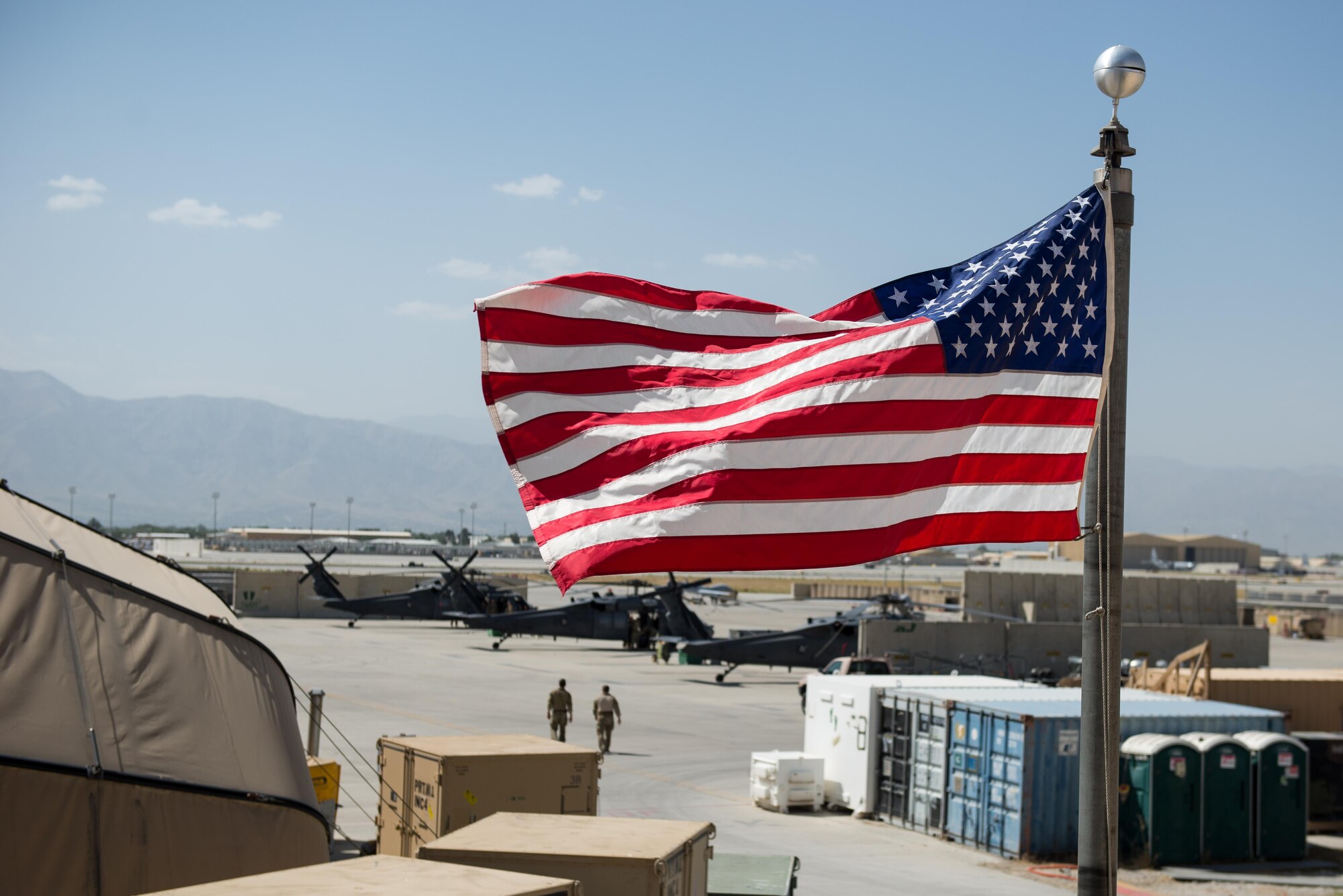 U.S. Air Force Guardian Angel team members assigned to the 83rd Expeditionary Rescue Squadron walk to HH-60 Pave Hawk helicopters before a mission July 16, 2015, at Bagram Airfield, Afghanistan. 83rd ERQS mission is to rescue, recover, and return American or allied forces in times of danger or extreme duress.  (U.S. Air Force photo by Tech. Sgt. Joseph Swafford/Released)
