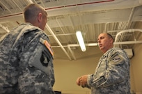 In this image released by the Army Reserve, soldiers and contractors with the 75th Training Command provide information technology support for a simulation training exercise in Houston, Texas, Saturday, Oct. 20, 2012. The exercise was part of an effort to demonstrate a system developed by the 75th to allow various military units to conduct certain types of scenario-based ‘war game’ training over computer networks. Using the system, reserve component military units are able to train in leadership and mission management tasks with a high degree of realism, and a low overall cost.  (Photo/75th Training Command, Army Reserve Maj. Adam Collett) 