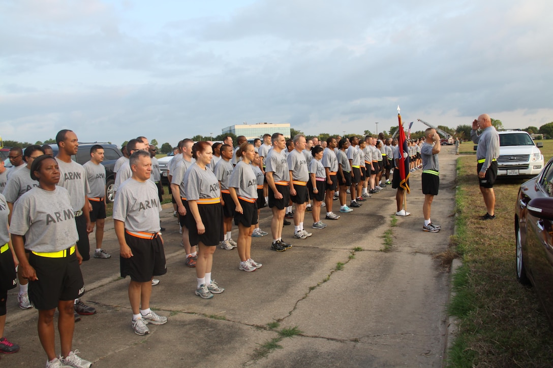 In this image released by the U.S. Army Reserve, soldiers with the 75th Training Command prepare for a charity fundraising race in Houston, Texas, Saturday, Sept. 8, 2012. The race, known as the 9-11 Heroes Run, was held to honor emergency responders and military personnel. As part of their participation, the troops marched approximately a mile from their headquarters at Ellington Field Joint Reserve base, to the adjacent Ellington International Airport where the race was held. The unit’s commander, Maj. Gen. Jimmie Jaye Wells, addressed the troops before the run began. (Photo/75th Training Command, Army Reserve Sgt. 1st Class Johnnie Beatty) 