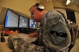 In this image released by the 75th Training Command, Army Reserve soldiers and contractors with the unit’s Southern Division operate a computer-based simulation training exercise in Houston, Texas, Saturday, Oct. 20, 2012. The exercise was part of an effort to demonstrate a system developed by the 75th to allow various military units to conduct certain types of scenario-based ‘war game’ training over computer networks. In this exercise, the unit undergoing the training was located in Louisiana, while one small team – pictured here – transmitted the fictional scenario via network and phone. This format allows units to train in leadership and mission management tasks with a high degree of realism, and a low overall cost.  (Photo/75th Training Command, Army Reserve Maj. Adam Collett) 