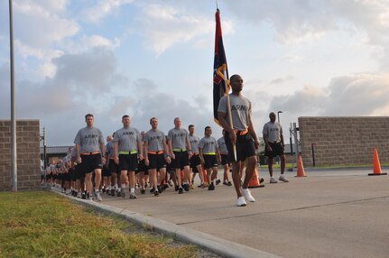 In this image released by the U.S. Army Reserve, soldiers with the 75th Training Command prepare for a charity fundraising race in Houston, Saturday, Sept. 8, 2012. The race, known as the 9-11 Heroes Run, was held to honor emergency responders and military personnel. As part of their participation, the troops marched approximately a mile from their headquarters at Ellington Field Joint Reserve base, to the adjacent Ellington International Airport where the race was held. The unit's commander, Maj. Gen. Jimmie Jaye Wells, addressed the troops before the run began.