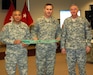 The 75th Division Commander Maj. Gen Eldon Regua and Division Safety Officer Chief Warrant Officer Robert Shultz, accepts the Army Safety Excellence Streamer from Maj. Gen. James Sholar, Deputy Commanding General, United States Army Reserve Command.  The 75th Division earned the award by achieving 12 consecutive months without a Soldier or unit at fault Class A or B accident.  