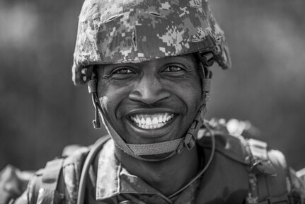 Sgt. 1st Class Folarin Durosawo, from Dallas, with 456th Medical Company, stands for a portrait after finishing a 10-kilometer foot march in the North Carolina heat May 5 during the 2015 Army Reserve Best Warrior Competition at Fort Bragg. This year's Best Warrior Competition will determine the top noncommissioned officer and junior enlisted Soldier who will represent the Army Reserve in the Department of the Army Best Warrior Competition later this year at Fort Lee, Va. (U.S. Army photo by Sgt. 1st Class Michel Sauret)