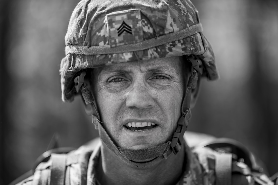 Sgt. Dee McMurdo, from Bellevue, Idaho, with the 11th Battalion (Observer/Controller Trainer), stands for a portrait after finishing a 10-kilometer foot march in the North Carolina heat May 5 during the 2015 Army Reserve Best Warrior Competition at Fort Bragg. This year's Best Warrior Competition will determine the top noncommissioned officer and junior enlisted Soldier who will represent the Army Reserve in the Department of the Army Best Warrior Competition later this year at Fort Lee, Va. (U.S. Army photo by Sgt. 1st Class Michel Sauret)