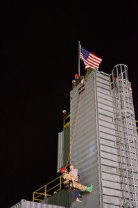 A U.S. Army Reserve Soldier from the 493rd Engineer Detachment, 412th Theater Engineer Command, from Pascagoula, Miss., rappels down a training tower to recover a simulated victim during Operation Guardian 15, June 25, near Ocala, Fla. More than 500 Army Reserve Soldiers and an active Army unit are participating in the exercise to test their search and rescue, hazardous materials, decontamination, and medical triage capabilities. (U.S. Army photo by Brian Godette/Released)