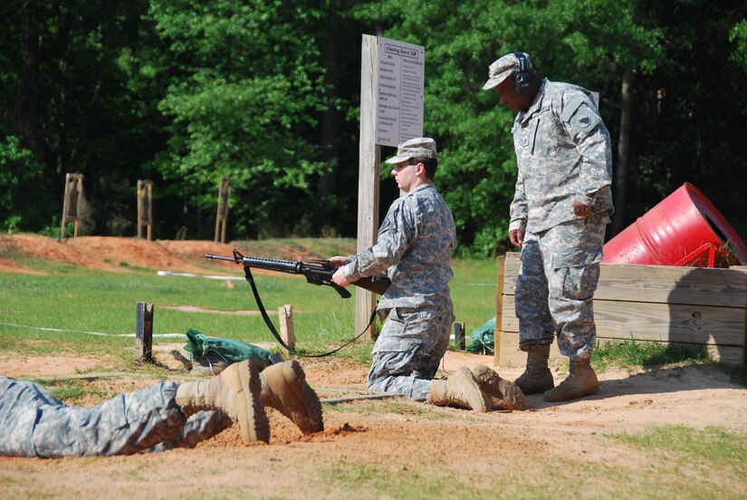 Range safety is first priority for the 104th Training Division (LT) Timberwolves whether the 12th Legal Operations Detachment Soldier is firing the M16 or M9. (Photo by Master Sgt. Deborah Williams, 108th Training Command (IET), Public Affairs)