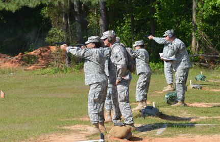 Range safety is first priority for the 104th Training Division (LT) Timberwolves whether the 12th Legal Operations Detachment Soldier is firing the M16 or M9. (Photo by Master Sgt. Deborah Williams, 108th Training Command (IET), Public Affairs)