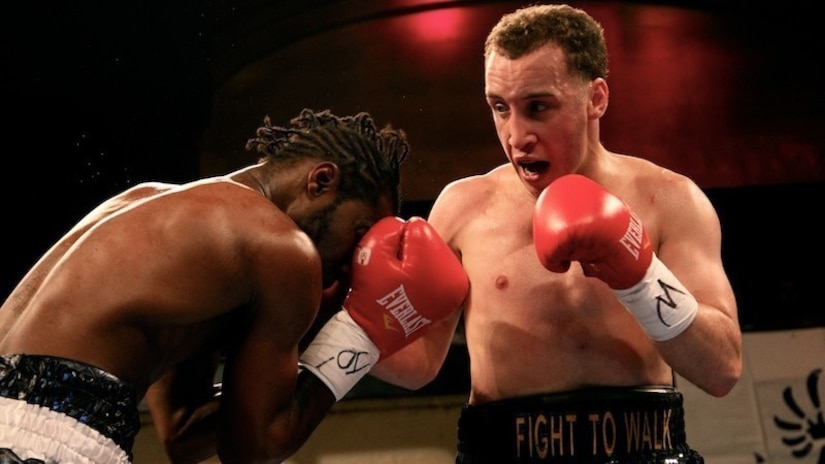 Army Capt. Boyd Melson, seen here in a past fight, is preparing for a title match on Friday, May 8.