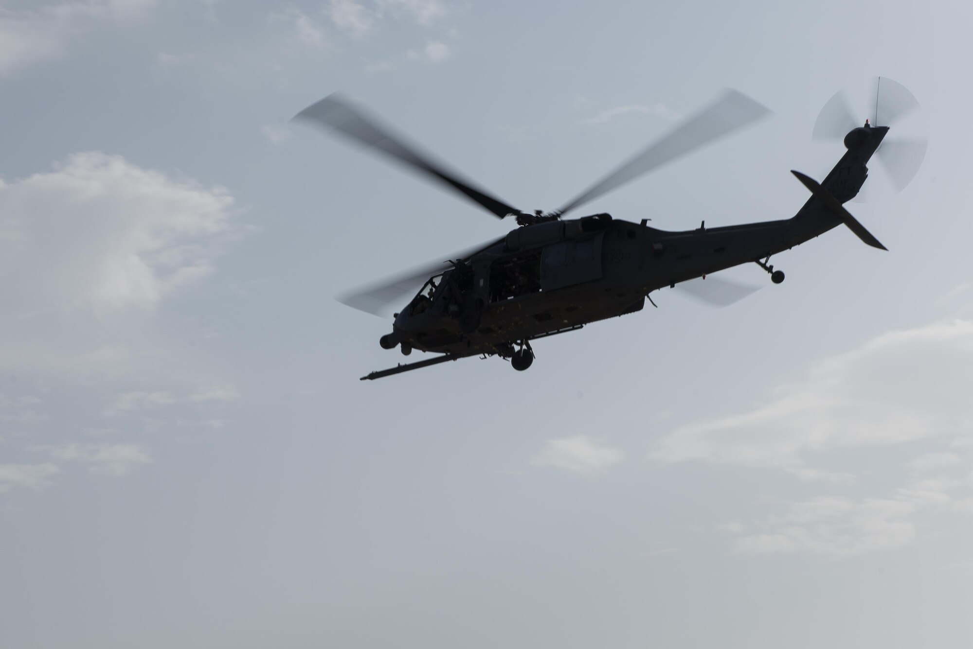 A U.S. Air Force HH-60G Pave Hawk helicopter assigned to the 83rd Expeditionary Rescue Squadron takes off during Guardian Angel High Altitude Low Opening jump training at Bagram Airfield, Afghanistan, July 18, 2015. The 83rd ERQS mission is to rescue, recover, and return American or allied forces in times of danger or extreme duress. (U.S. Air Force photo by Tech. Sgt. Joseph Swafford/Released)