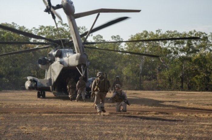 U.S. Marines from Battalion Landing Team, 2nd Battalion 5th Marines, 31st Marine Expeditionary Unit run towards a CH-53E Super Stallion while conducting a Tactical Recovery of Aircraft and Personnel near Fog Bay, Northern Territory, Australia, during exercise Talisman Sabre, July 9. Talisman Sabre 15 provides an invaluable opportunity to conduct operation in a combined, joint, and interagency environment that will increase the U.S and Australia’s ability to plan and execute contingency responses, from combat missions to humanitarian efforts.