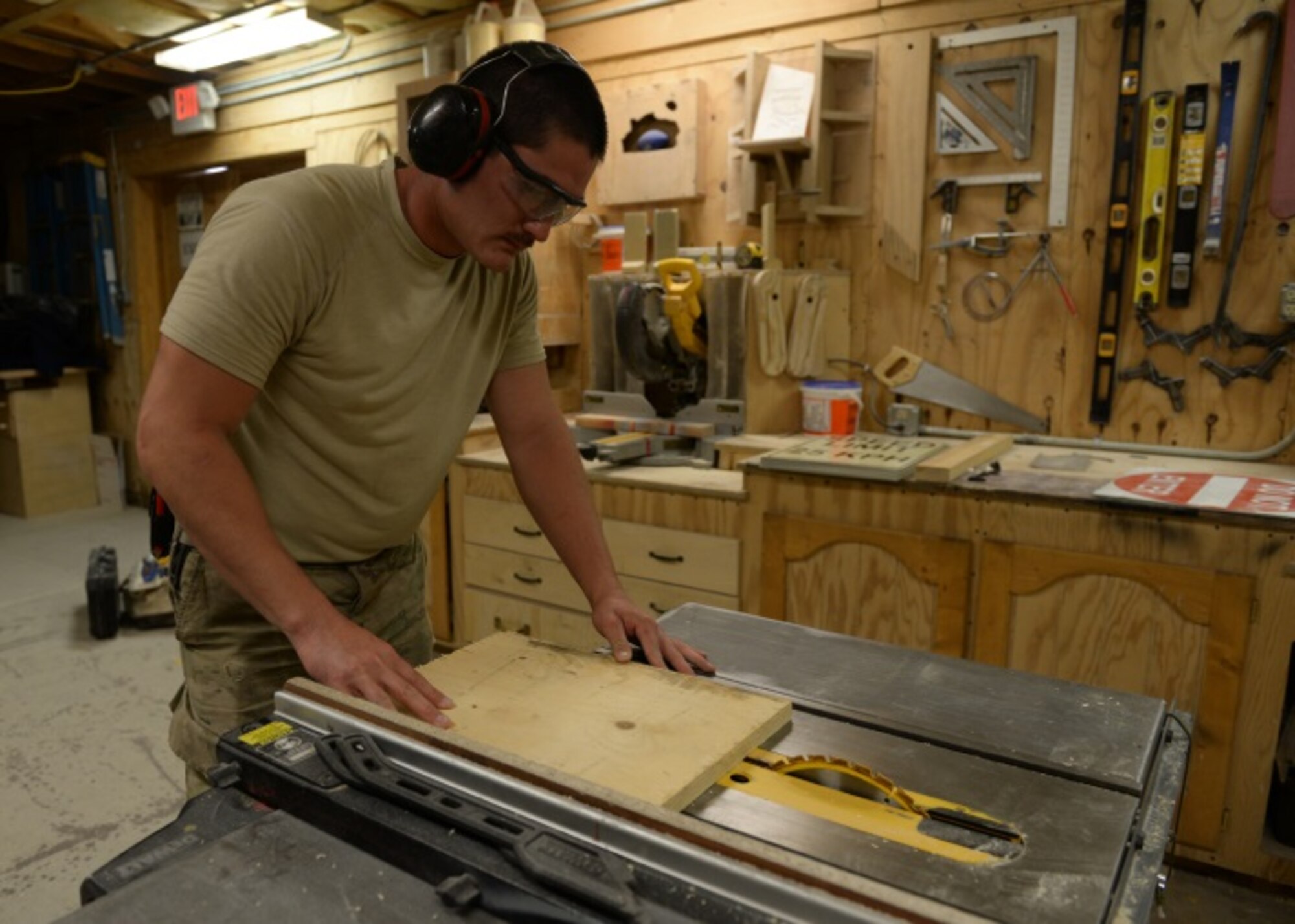 U.S. Air Force Senior Airman Carl Vanlandingham, 455th Expeditionary Civil Engineer Squadron structural journeyman, works on a project July 16, 2015, at Bagram Airfield, Afghanistan. Vanlandingham builds various projects during duty and on his days off to support the mission here. (U.S. Air Force photo by Senior Airman Cierra Presentado/Released)
