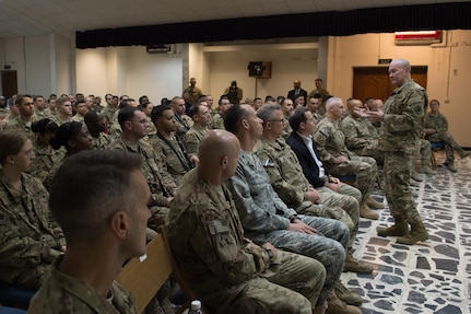 18th Chairman of the Joint Chiefs of Staff Gen. Martin E. Dempsey talks with Service Members deployed to Iraq during townhall in Baghdad, Iraq, July 18, 2015.