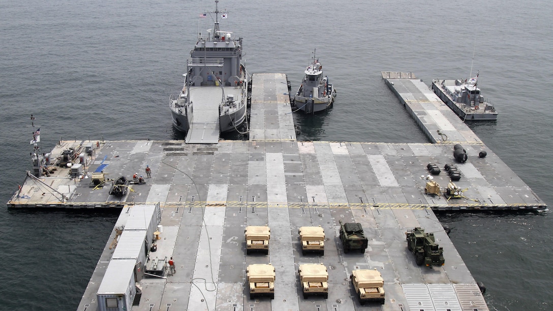 A Roll-on Roll-off Discharge Facility is attached to the USNS 2nd Lt. John P. Bobo (T-AK 3008) during the Combined Joint Logistics Over-the-Shore exercise off the shore of Anmyeon Beach, Republic of Korea, July 1, 2015. CJLOTS 2015 is an exercise designed to train U.S. and ROK services members to accomplish vital logistical measures in a strategic area while strengthening communication and cooperation in the U.S.-ROK Alliance. 