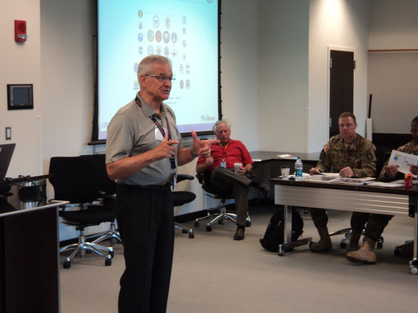 Retired U.S. Air Force Lieutenant General Christopher A. Kelly, Director of the Center for Joint & Strategic Logistics, welcomes attendees to the 2015 Joint Logistics Faculty Development Workshop held recently at Fort McNair, Washington DC.