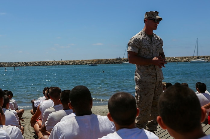 Captain Steven Uziel, the assistant operations officer assigned to 1st Reconnaissance Battalion, 1st Marine Division, speaks to Devil Pups after a demonstration to show the students 1st Recon’s amphibious capabilities aboard Marine Corps Base Camp Pendleton, Calif., July 12, 2015. The demonstration and question and answer session was held to inform the students about the reconnaissance community. (U.S. Marine Corps photo by Cpl. Will Perkins)
