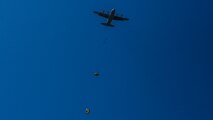 Marines assigned to Company A, 1st Marine Reconnaissance Battalion, 1st Marine Division, perform parachute jumps into the ocean at Marine Corps Base Camp Pendleton, California, July 14, 2015.  The Marines and Sailors conducted low-level static-line parachute operations with intentional water landings to make insertions, where other means such as boats or high-altitude parachute jumps may not be available.