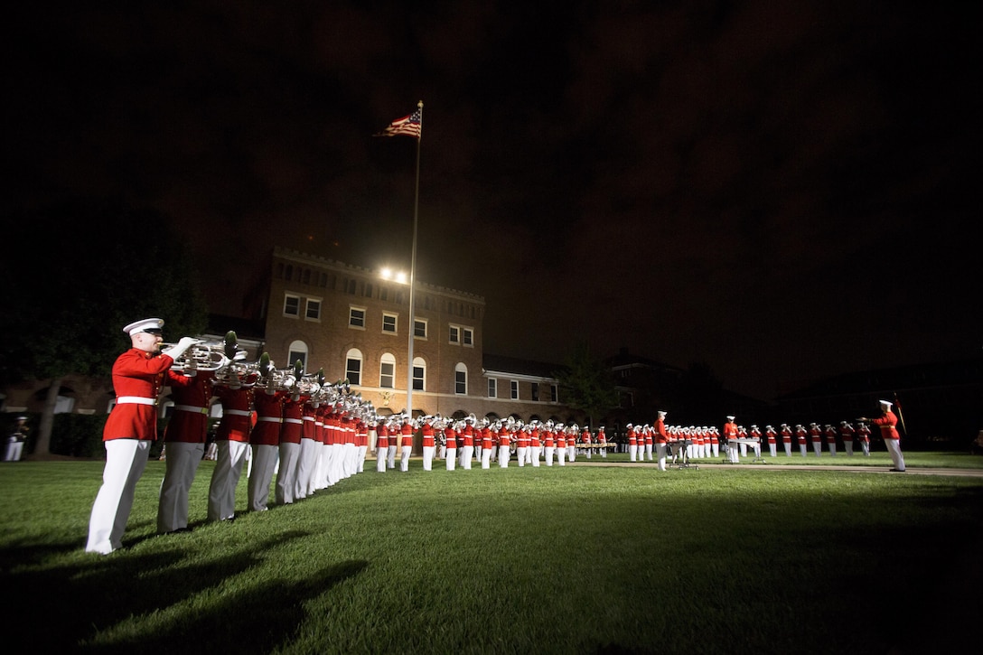 The United States Drum and Bugle Corps performs during a Friday Evening Parade at Marine Barracks Washington, D.C., July 17, 2015. The guest of honor for the Evening Parade was Rhode Island Sen. Jack Reed, and the hosting official was Gen. John Paxton Jr., assistant commandant of the Marine Corps. (Official Marine Corps photo by Cpl. Chi Nguyen/Released)
