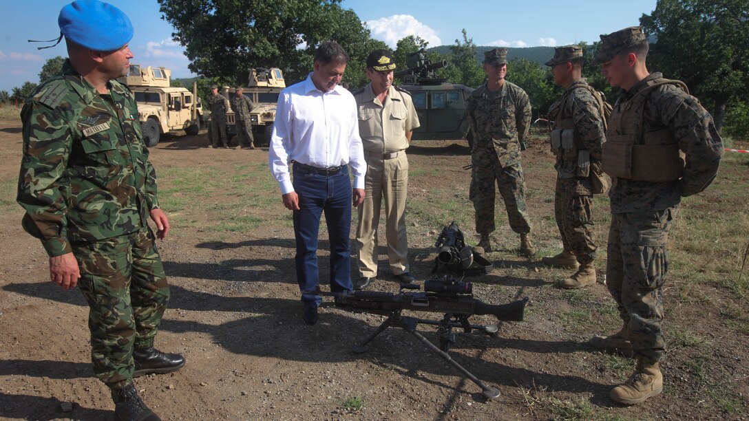 Nikoley Nenchev, the Minister of Defense of Bulgaria, greets Marines from 2nd Battalion, 8th Marine Regiment, Black Sea Rotational Force, during Distinguished Visitors Day at Platinum Lion 15-3. The Marines spent two weeks alongside soldiers from Bulgaria, Albania, United Kingdom and Romania during the multi-national NATO training exercise at Novo Selo Training Area, Bulgaria.