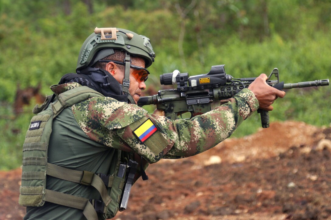 A Colombian special operations soldier fires his weapon on the 25-meter marksmanship lane during Fuerzas Comando 2015 in Poptun, Guatemala, July 16, 2015.
