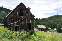 Abandoned old buildings are scattered around Elkhorn, a once booming mining town nestled in the Elkhorn Mountains is southwestern Montana. At one point during its prime, Elkhorn was producing nearly 11 tons of ore per day. The total value its mines produced is estimated at nearly $14 million in gold, silver and iron from 1880 to about 1971. (U.S. Air Force photo/Tech. Sgt. Chad Thompson)