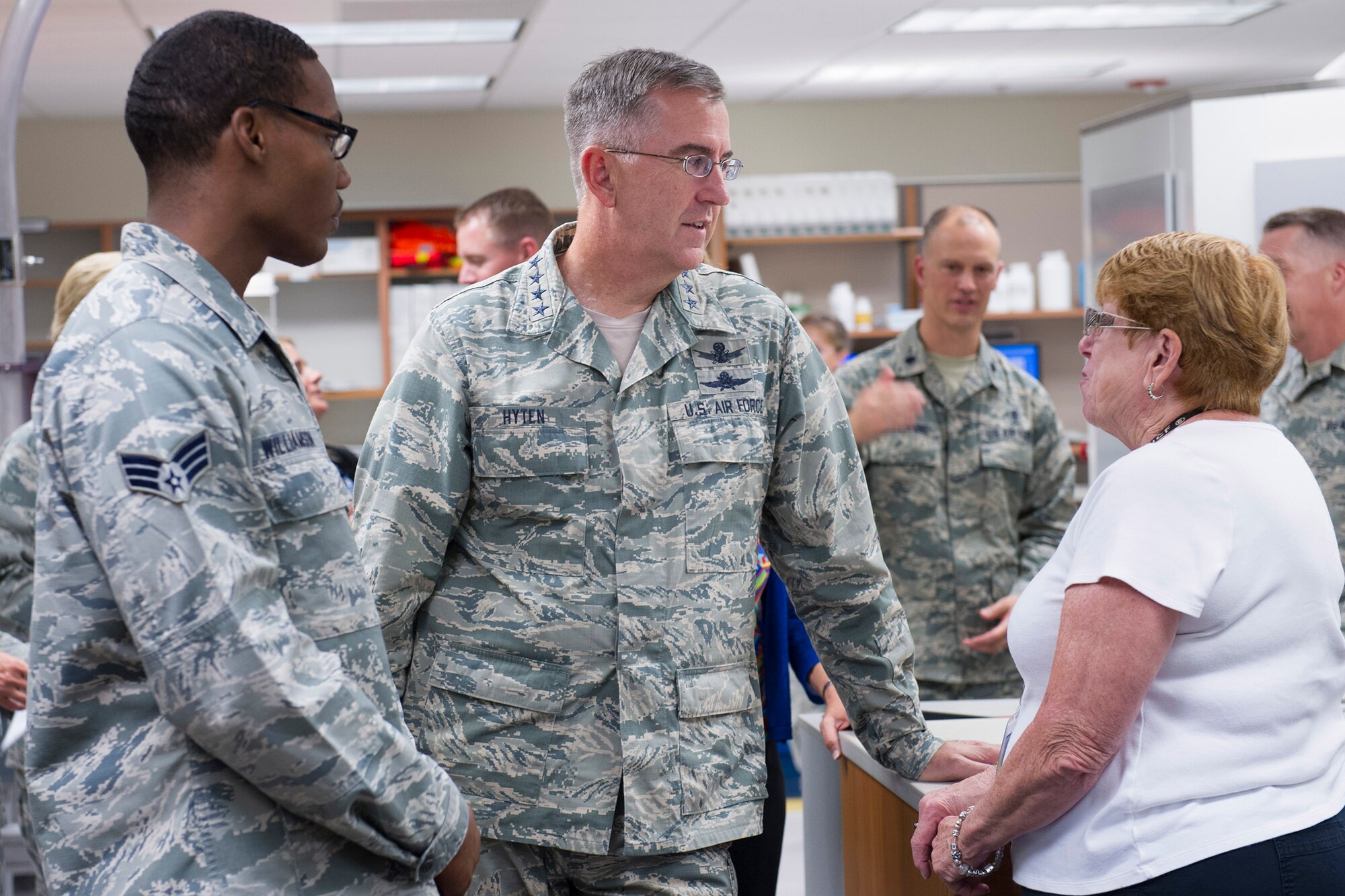 Gen. John Hyten, commander, Air Force Space Command, speaks with the 45th Medical Group’s Satellite Pharmacy staff during his visit to Patrick Air Force Base and Cape Canaveral Air Force Station July 14, 2015. The 45th Space Wing hosted the general, his wife, Laura, and Chief Master Sgt. Douglas McIntyre, the AFSPC Command Chief, as the wing prepared for the launch of the Global Positioning System IIF-10. (U.S. Air Force photo/Matthew Jurgens) (Released) 